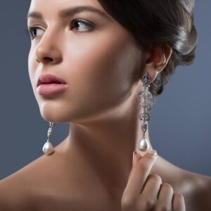 gorgeous woman with precious jewelry in studio.jpg